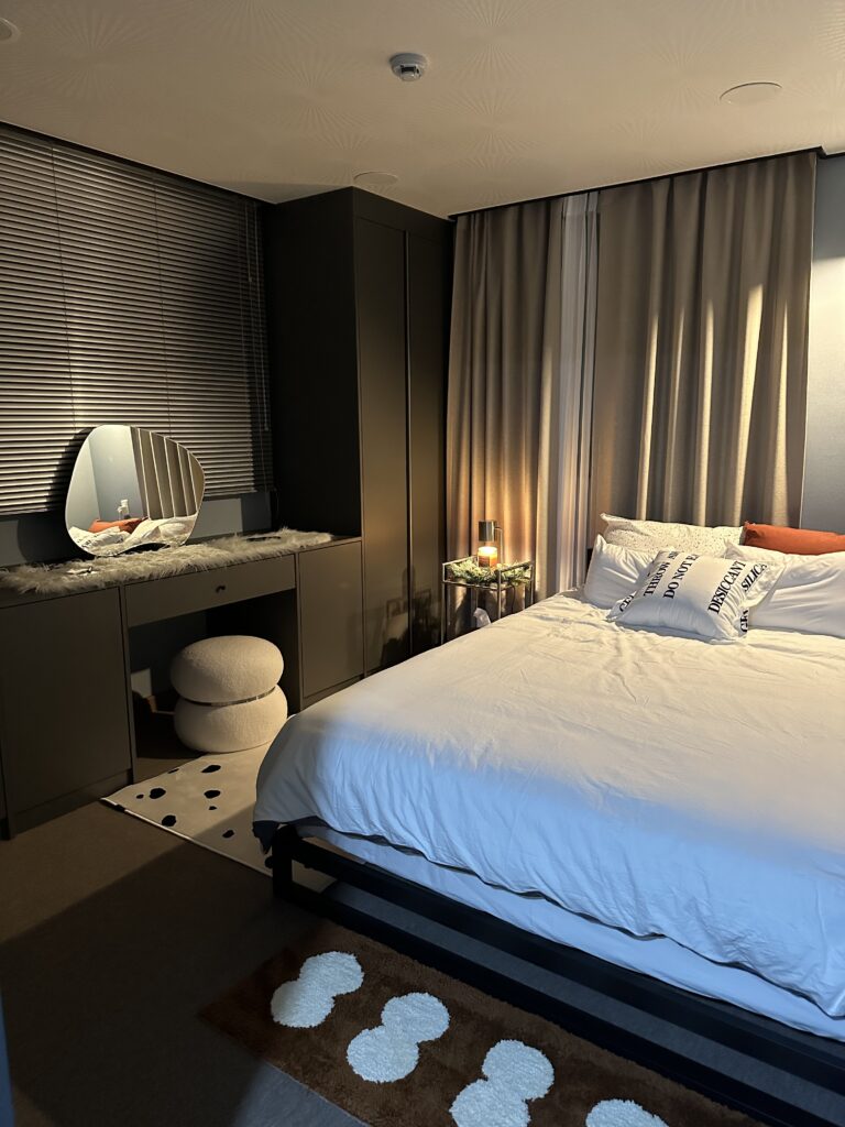 linen texture blackout curtains and sheer inner curtains enhance the experience