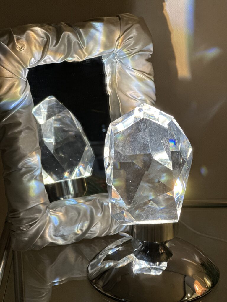 Mirror reflection showing pastel blue ballet core bedroom with rainbow light effects perfect for Instagram photos